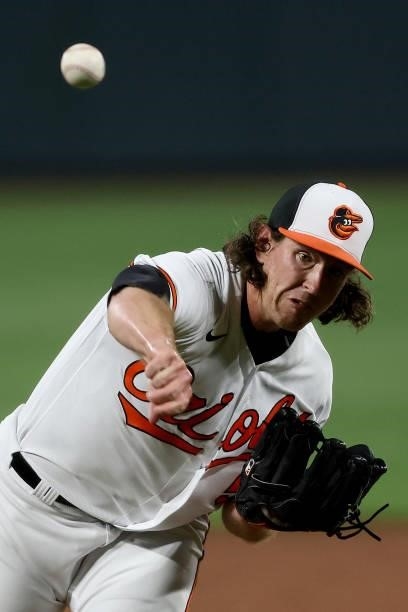 Mike Baumann of the Baltimore Orioles throws to a Kansas City Royals batter during his MLB debut in the fifth inning at Oriole Park at Camden Yards...