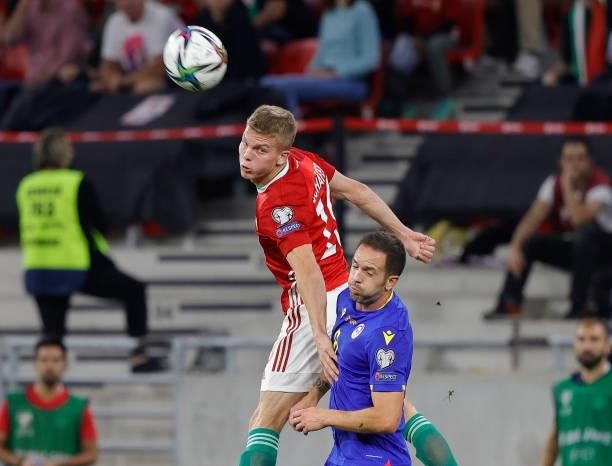 Andras Schafer of Hungary battles for the ball in the air with Marcio Vieira of Andorra during the FIFA World Cup 2022 Qatar qualifying match between...