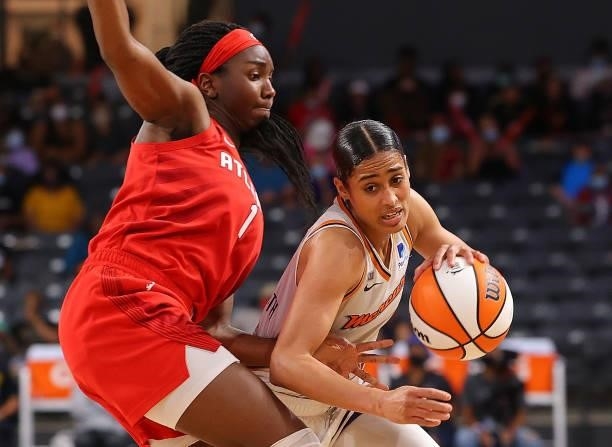 Skylar Diggins-Smith of the Phoenix Mercury drives against Elizabeth Williams of the Atlanta Dream during the second half at Gateway Center Arena on...