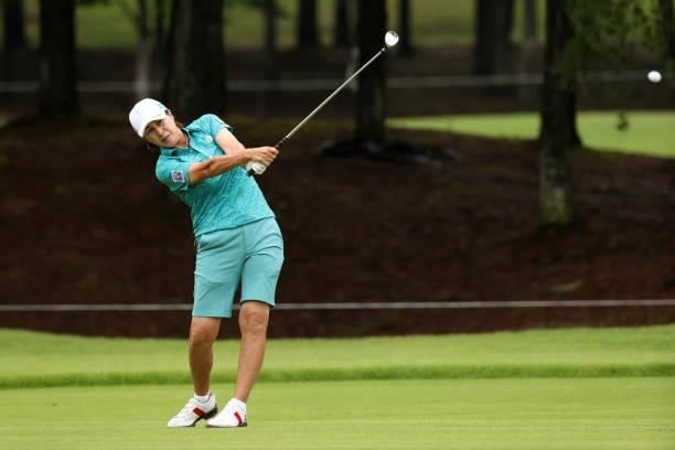 Nobuko Kizawa of Japan hits her third shot on the 6th hole during the first round of the JLPGA Championship Konica Minolta Cup at Shizu Hills Country...