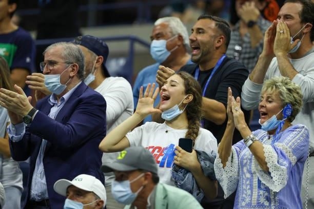 Fans cheer for Novak Djokovic of Serbia as he takes on Matteo Berrettini of Italy during his Men's Singles quarterfinal match on Day Ten of the 2021...
