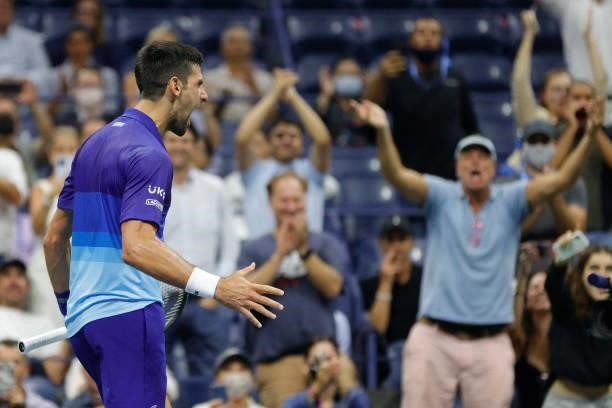 Novak Djokovic of Serbia reacts as he plays against Matteo Berrettini of Italy during his Men's Singles quarterfinal match on Day Ten of the 2021 US...