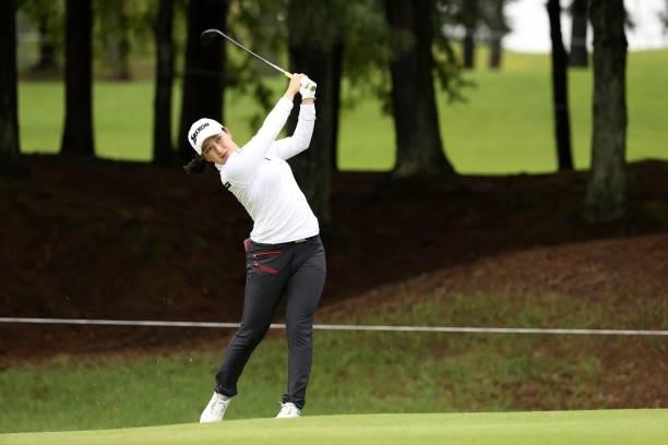 Sakura Koiwai of Japan hits her second shot on the 6th hole during the first round of the JLPGA Championship Konica Minolta Cup at Shizu Hills...