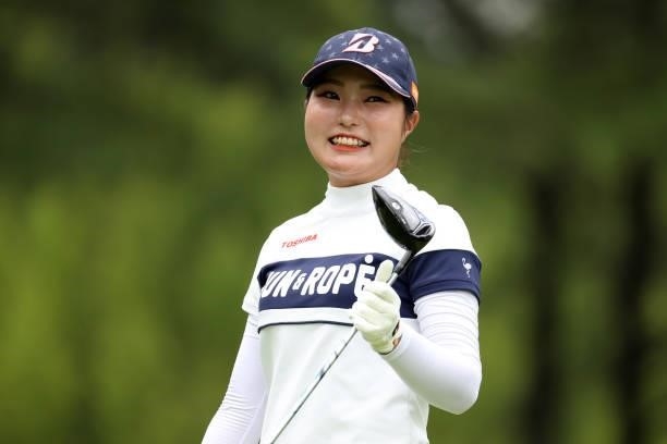 Sayaka Takahashi of Japan smiles after her tee shot on the 7th hole during the first round of the JLPGA Championship Konica Minolta Cup at Shizu...