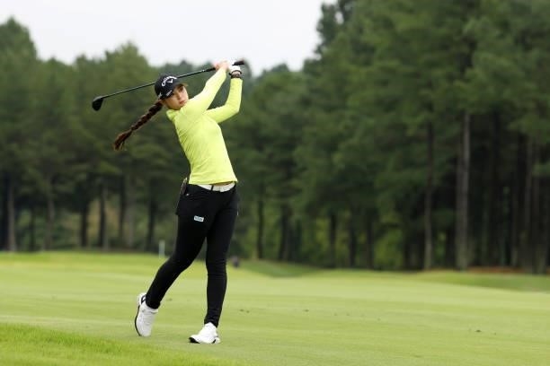 Asuka Kashiwabara of Japan hits her second shot on the 7th hole during the first round of the JLPGA Championship Konica Minolta Cup at Shizu Hills...