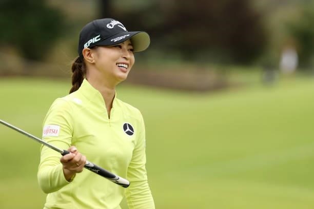 Asuka Kashiwabara of Japan smiles after her second shot on the 7th hole during the first round of the JLPGA Championship Konica Minolta Cup at Shizu...