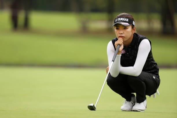 Maria Shinohara of Japan lines up a putt on the 9th green during the first round of the JLPGA Championship Konica Minolta Cup at Shizu Hills Country...