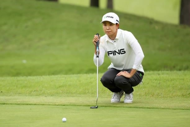 Yoko Maeda of Japan lines up a putt on the 9th green during the first round of the JLPGA Championship Konica Minolta Cup at Shizu Hills Country Club...