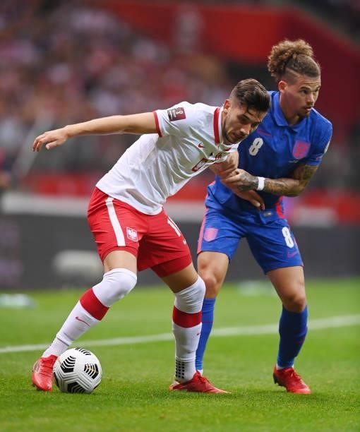 Jakub Moder of Poland and Kalvin Phillips of England in action during the 2022 FIFA World Cup Qualifier between Poland and England at Stadion...
