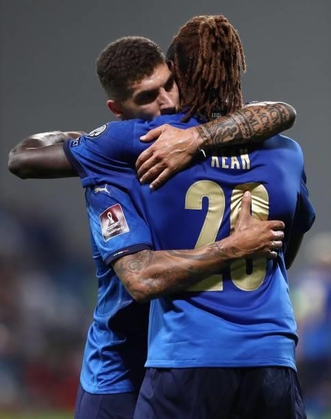 Moise Kean of Italy with his team-mate Giovanni Di Lorenzo during the 2022 FIFA World Cup Qualifier match between Italy and Lithuania at Mapei...