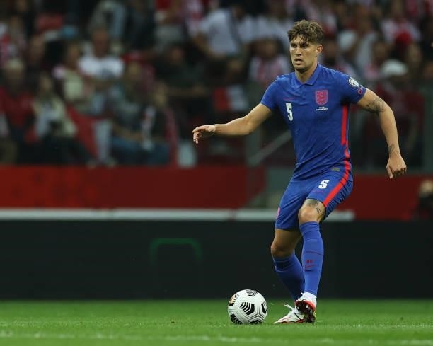 John Stones of England in action against Poland at Stadion Narodowy on September 08, 2021 in Warsaw, Poland.