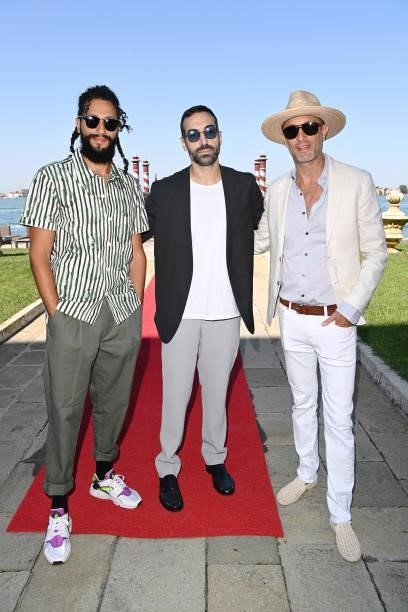 Mohammed Al Turki, Rawkan Binbella and Andy Boose attends a luncheon hosted by amfAR during the 78th Venice International Film Festival on September...