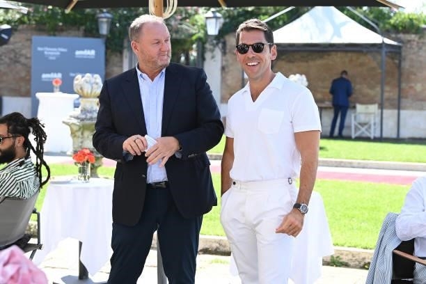 Kevin Robert Frost and Emir Uyar attend a luncheon hosted by amfAR during the 78th Venice International Film Festival on September 09, 2021 in...