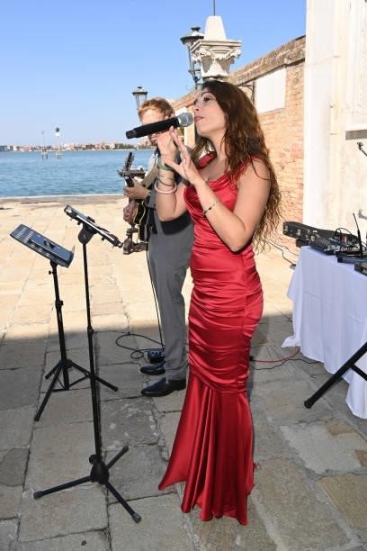 Chiara Di Bari performs during a luncheon hosted by amfAR during the 78th Venice International Film Festival on September 09, 2021 in Venice, Italy.