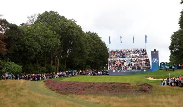 Golf fans watching the action on the par three 14th hole during the first round of The BMW PGA Championship at Wentworth Golf Club on September 09,...
