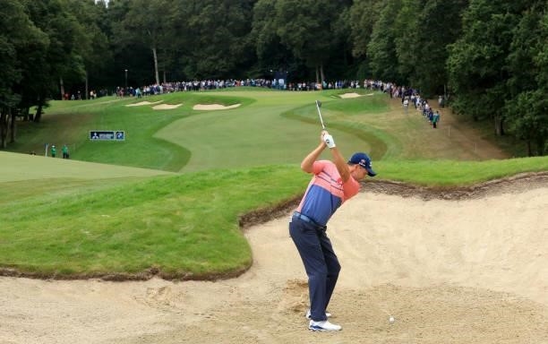 Padraig Harrington of Ireland plays his second shot on the first hole during the first round of The BMW PGA Championship at Wentworth Golf Club on...