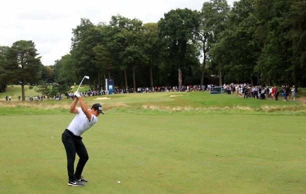 Viktor Hovland of Norway plays his second shot on the 15th hole during the first round of The BMW PGA Championship at Wentworth Golf Club on...