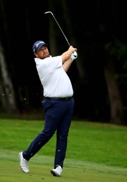 Shane Lowry of Ireland plays his second shot on the 16th hole during the first round of The BMW PGA Championship at Wentworth Golf Club on September...