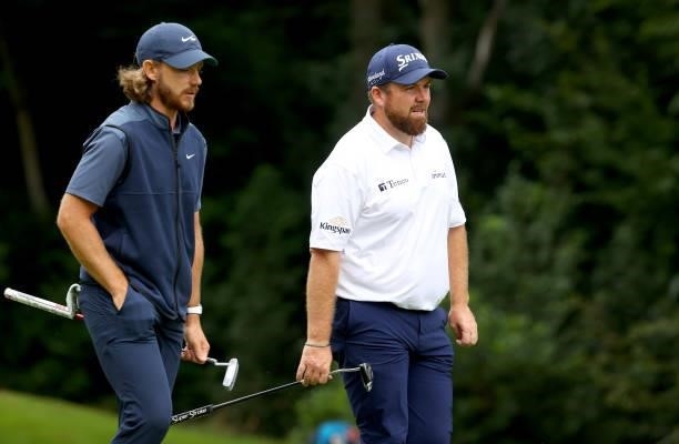 Tommy Fleetwood of England and Shane Lowry of Ireland on the 16th hole during the first round of The BMW PGA Championship at Wentworth Golf Club on...