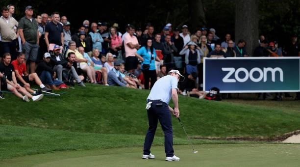 Robert McIntyre of Scotland makes a putt on the 18th green during Day One of The BMW PGA Championship at Wentworth Golf Club on September 09, 2021 in...