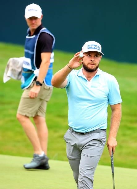 Tyrrell Hatton of England on the 18th green during the first round of The BMW PGA Championship at Wentworth Golf Club on September 09, 2021 in...