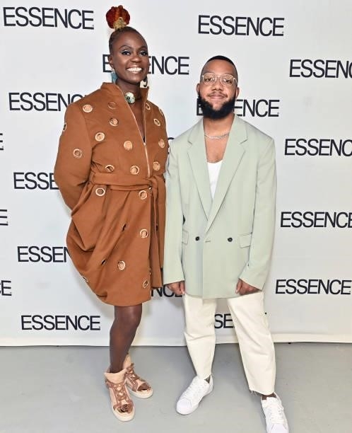 Arc of Andre designer Andre Moses poses for a photo with Caroline Wanga, CEO of ESSENCE during the ESSENCE Fashion House - Red Carpet on September...