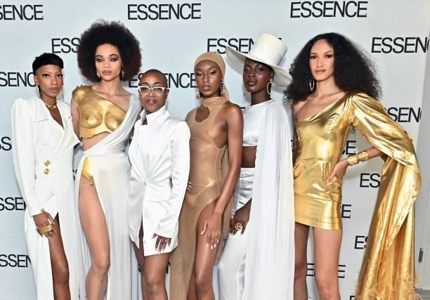 Designer Megan Carter poses for a photo with models at the ESSENCE Fashion House - Red Carpet on September 09, 2021 in New York City.