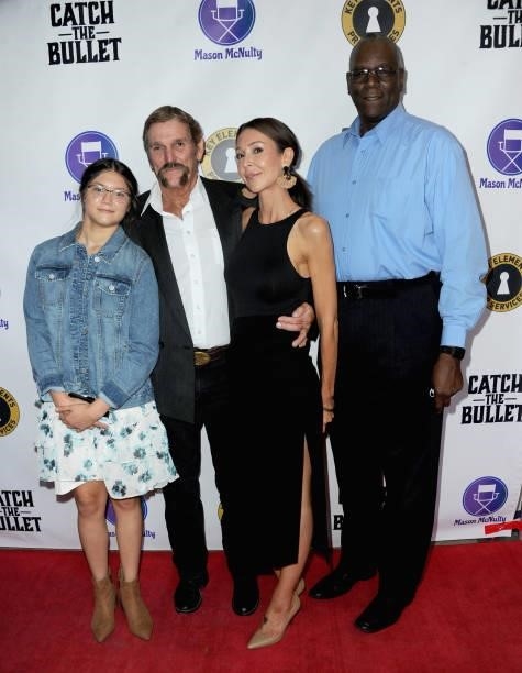 Aubrey Fong, Vernon Walker, Camille Fong and Ray Patterson arrive for the Red Carpet Screening Of "Catch The Bullet