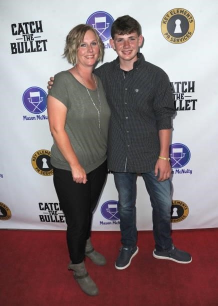 Ryder Kozisek and mom arrive for the Red Carpet Screening Of "Catch The Bullet