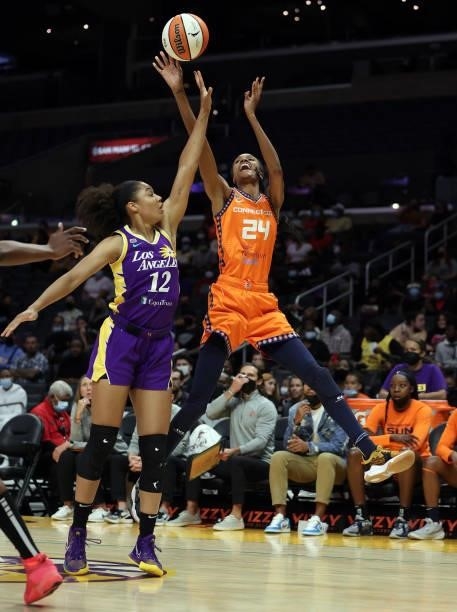 DeWanna Bonner of the Connecticut Sun takes a shot against Nia Coffey of the Los Angeles Sparks in the first quarter at Staples Center on September...