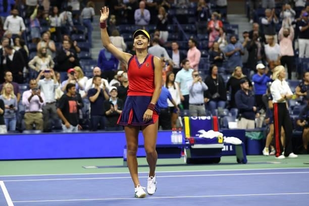 Emma Raducanu of Great Britain celebrates defeating Maria Sakkari of Greece during their Women’s Singles semifinals match on Day Eleven of the 2021...