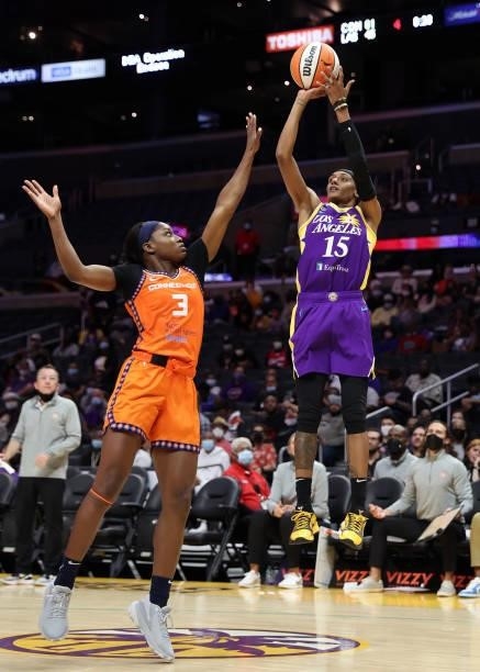 Brittney Sykes of the Los Angeles Sparks takes a shot against Kaila Charles of the Connecticut Sun in the fourth quarter at Staples Center on...