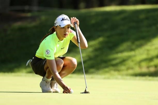 Naruha Miyata of Japan lines up a putt on the 6th green during the second round of the JLPGA Championship Konica Minolta Cup at Shizu Hills Country...