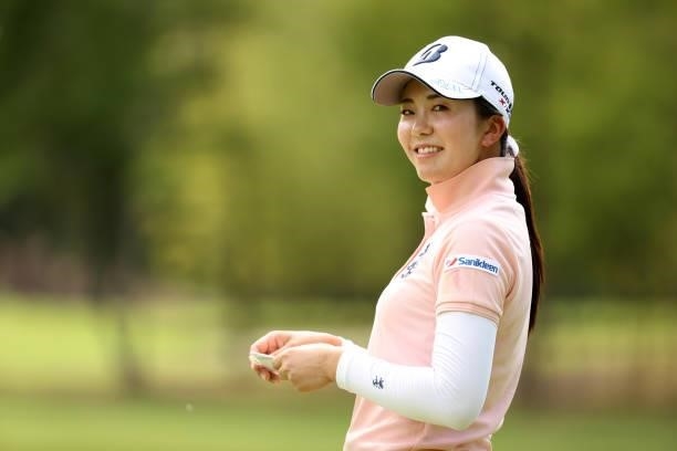 Kotone Hori of Japan smiles after holing out on the 9th green during the second round of the JLPGA Championship Konica Minolta Cup at Shizu Hills...