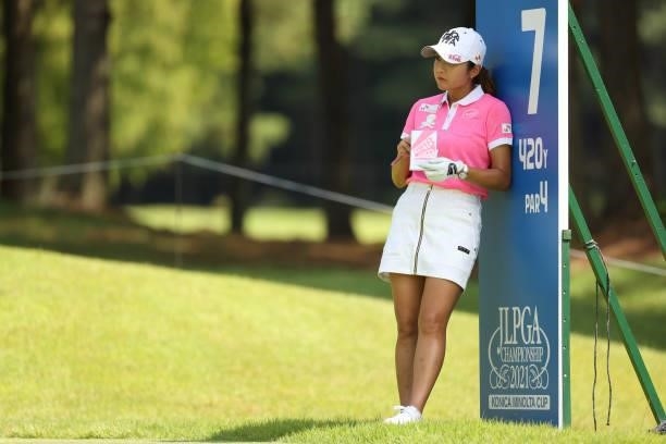 Bo-mee Lee of South Korea leans on the sign on the 7th tee during the second round of the JLPGA Championship Konica Minolta Cup at Shizu Hills...