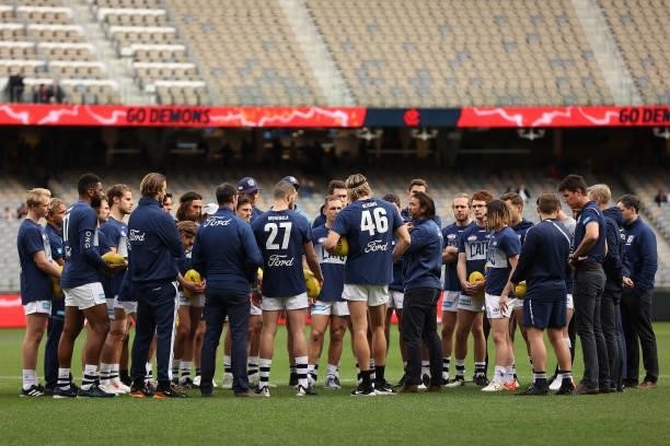 Chris Scott, head coach of the Cats addresses his players before the AFL First Preliminary Final match between the Melbourne Demons and Geelong Cats...