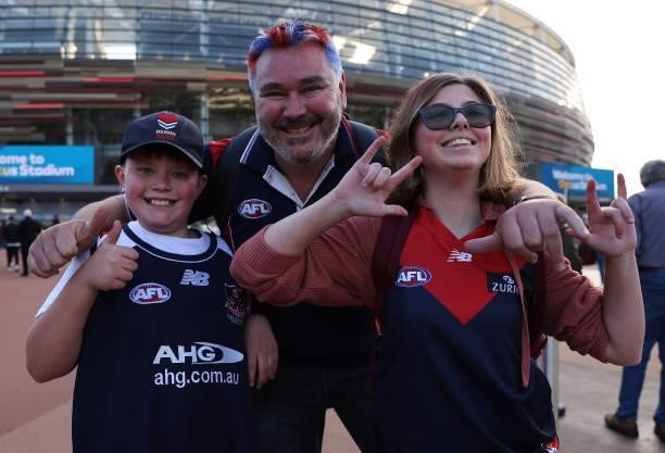 Fans arrive for the AFL First Preliminary Final match between Melbourne Demons and Geelong Cats at Optus Stadium on September 10, 2021 in Perth,...