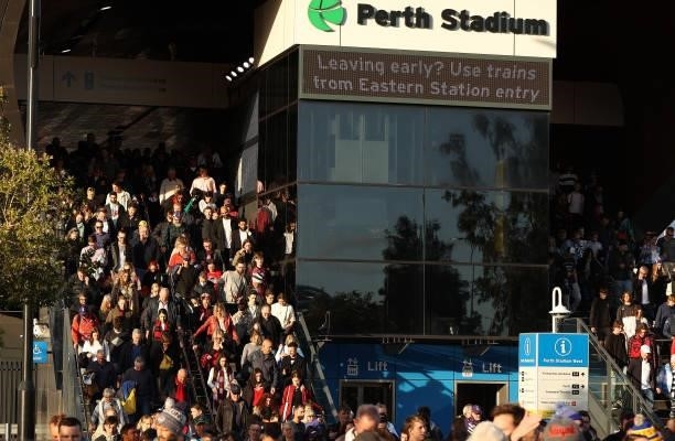 Fans arrive for the AFL First Preliminary Final match between Melbourne Demons and Geelong Cats at Optus Stadium on September 10, 2021 in Perth,...