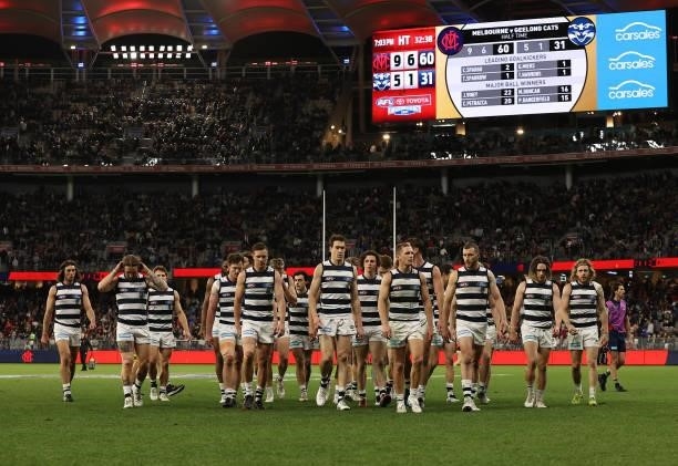 The Cats walk off at the half time break during the AFL First Preliminary Final match between Melbourne Demons and Geelong Cats at Optus Stadium on...