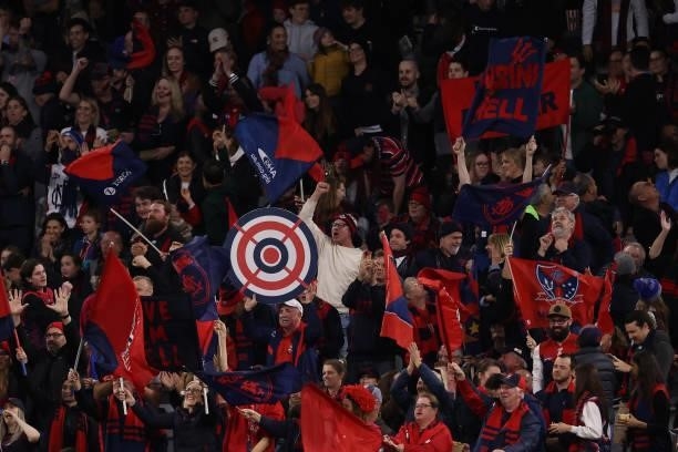 Demons fans cheer during the AFL First Preliminary Final match between Melbourne Demons and Geelong Cats at Optus Stadium on September 10, 2021 in...