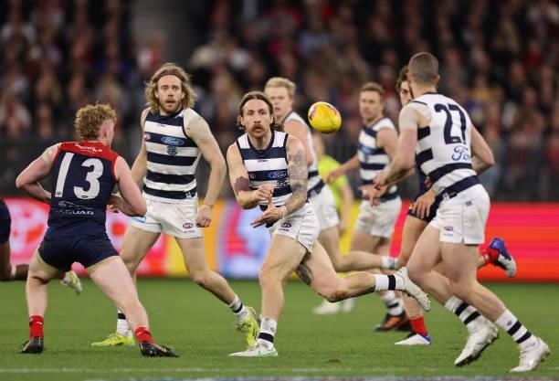 Zach Tuohy of the Cats handballs during the AFL First Preliminary Final match between Melbourne Demons and Geelong Cats at Optus Stadium on September...