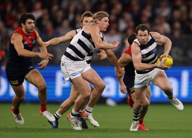 Patrick Dangerfield of the Cats runs with the ball during the AFL First Preliminary Final match between Melbourne Demons and Geelong Cats at Optus...