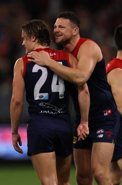 Steven May and Trent Rivers of the Demons celebrate after the Demons defeated the Cats during the AFL First Preliminary Final match between Melbourne...