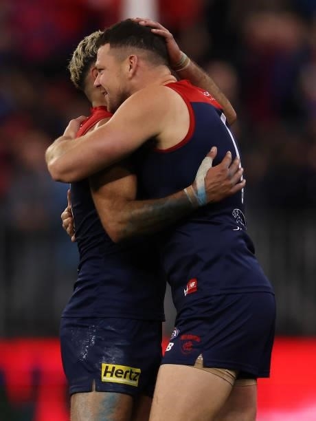 Steven May and Christian Salem of the Demons celebrate after the Demons defeated the Cats during the AFL First Preliminary Final match between...
