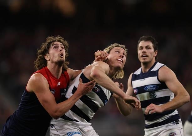 Luke Jackson of the Demons and Mark Blicavs of the Cats compete for the ball during the AFL First Preliminary Final match between Melbourne Demons...
