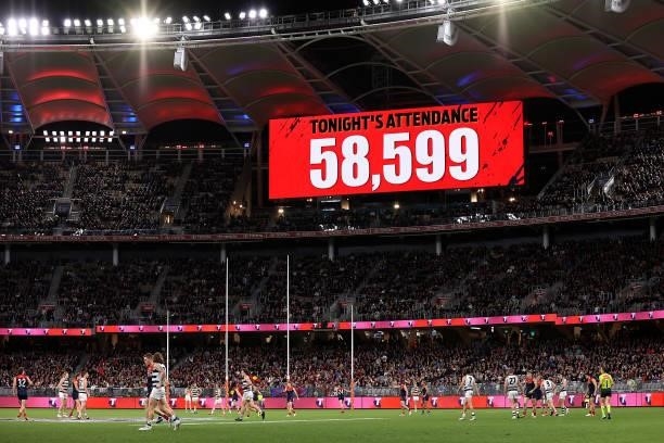 The game attendance figure is displayed during the AFL First Preliminary Final match between the Melbourne Demons and Geelong Cats at Optus Stadium...