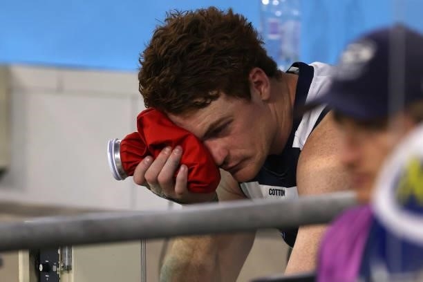 Gary Rohan of the Cats sits in the dug out at the three quarter time break during the AFL First Preliminary Final match between the Melbourne Demons...