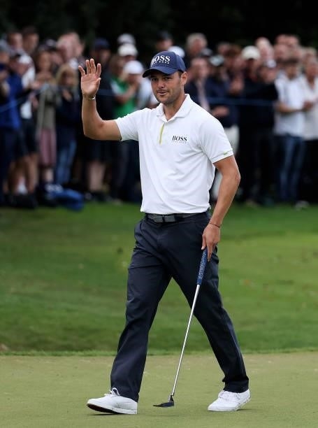 Martin Kaymer of Germany acknowledges the crowd after his putt on the 18th green during Day Two of The BMW PGA Championship at Wentworth Golf Club on...