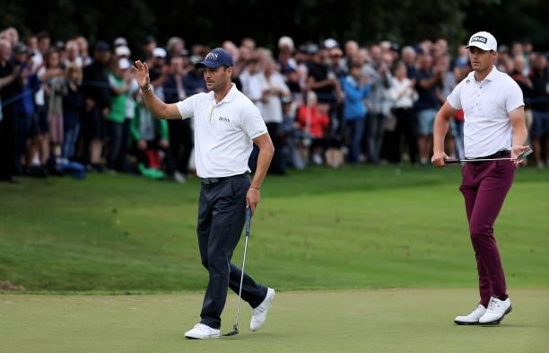 Martin Kaymer of Germany acknowledges the crowd after his putt on the 18th green during Day Two of The BMW PGA Championship at Wentworth Golf Club on...