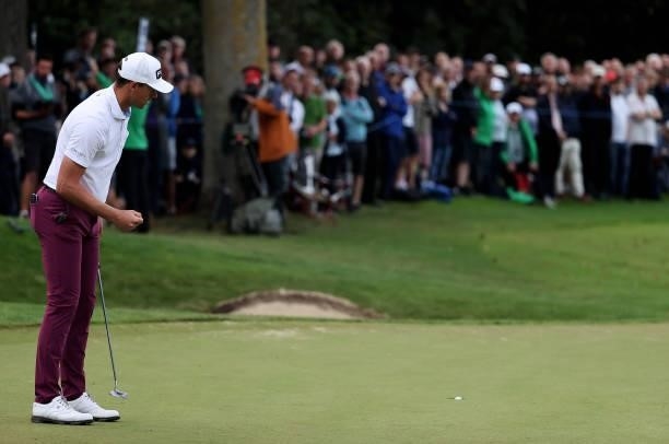 Victor Perez of France holds his putt on the 18th green during Day Two of The BMW PGA Championship at Wentworth Golf Club on September 10, 2021 in...